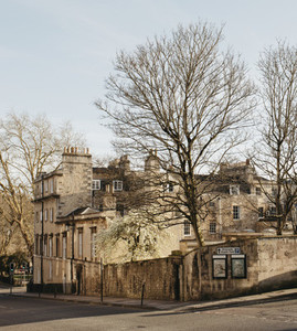 Sunny buildings and bare trees Bath Somerset UK