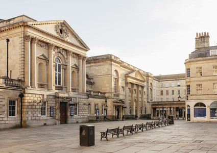 Ornate buildings and empty town square Bath Somerset UK