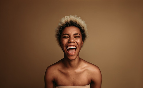 African american woman on brown background
