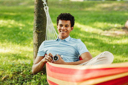 Young happy guy relaxing