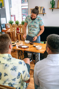 Young cook giving a cooking workshop