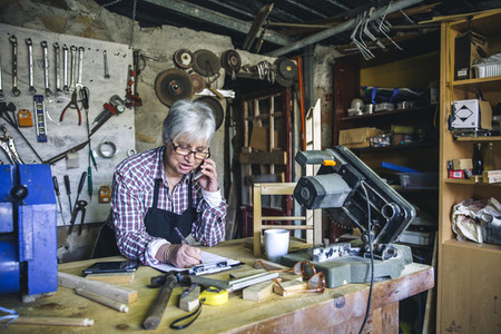 Female carpenter in her workshop