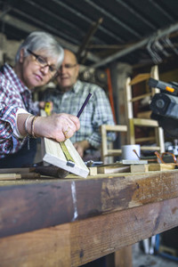 Senior couple in a carpentry