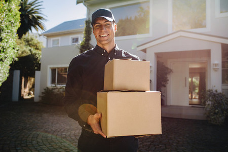 Courier worker delivering parcels
