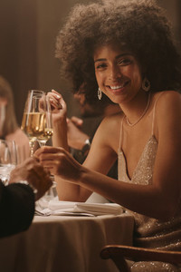 Smiling woman enjoying at a gala dinner event