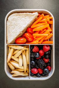 Top view of lunch box with healthy food