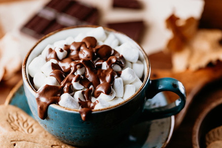 Close up of hot chocolate with marshmallows on the table  Autumn or winter cozy still life