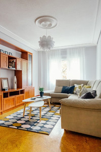 Interior of a living room with corner sofa