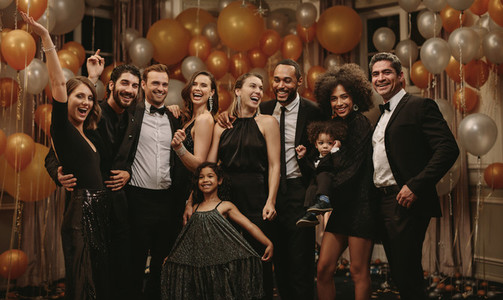 Group portrait of socialites on new years eve party