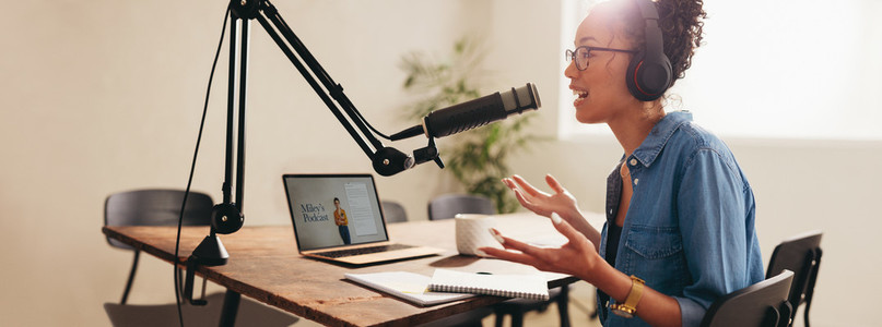 Woman recording a podcast