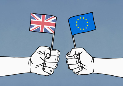 Hands holding Union Jack and European Union flags