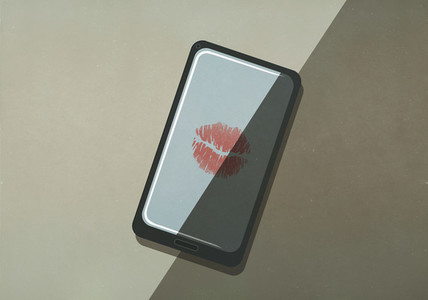 Lipstick kiss on smart phone screen