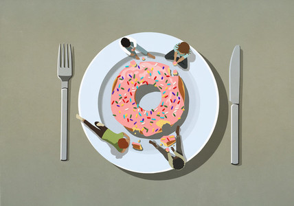 People indulging in large sprinkle donut on plate