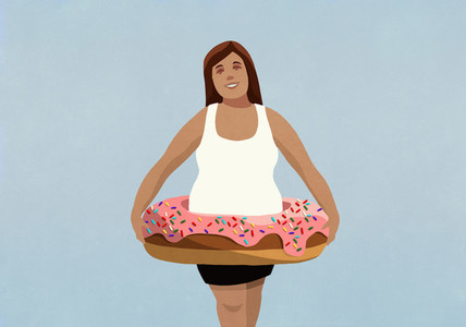 Portrait overweight woman wearing inflatable donut ring