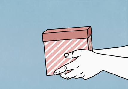 Hands holding gift box on blue background