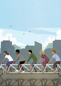 Diverse friends riding tandem bicycle in city