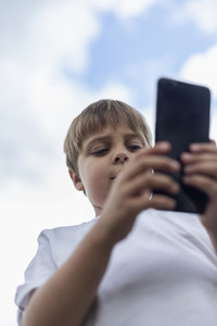 Boy using smart phone