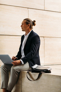Young businessman sitting