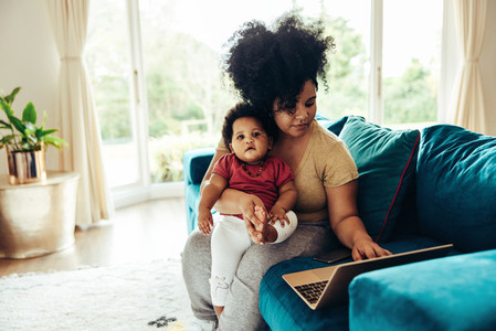 Freelancer working at home during maternity leave