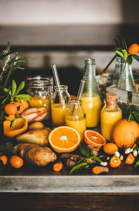 Fresh fruit vitamin immune boosting drink over concrete kitchen counter