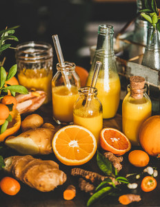 Fresh fruit vitamin immune boosting drink over kitchen counter  close up