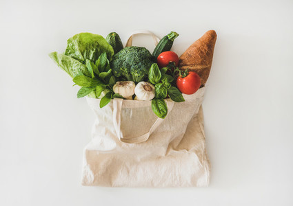 Online grocery healthy food shopping in eco friendly bag  top view