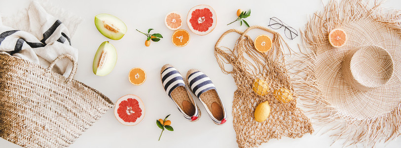 Summer mood layout with accessories and fruits  top view