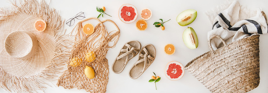Summer mood layout with feminine accessories and fruits  top view