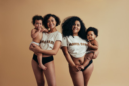 Beautiful and healthy mothers with babies