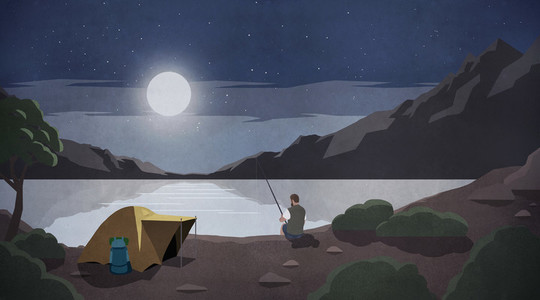 Moonlight over man fishing at remote lakeside campsite