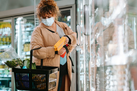 Woman shopping grocery during pandemic