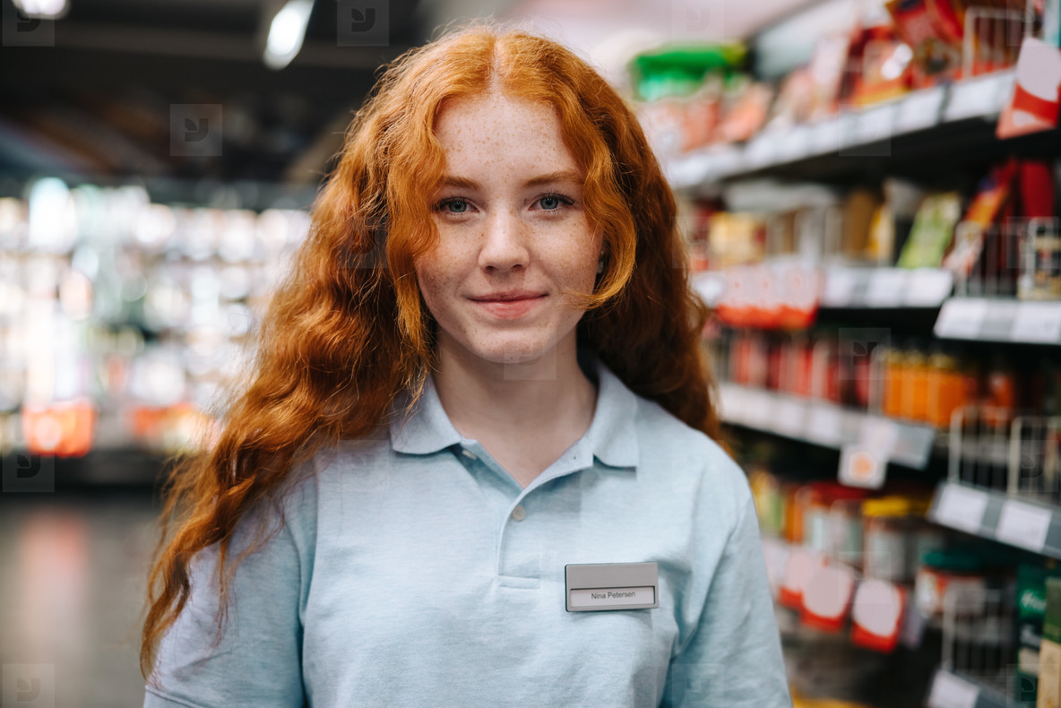 Young worker working in the grocery store