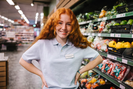 Confident supermarket assistant