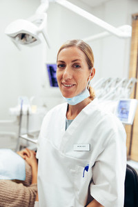 Portrait of confident dental expert