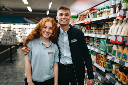 Two supermarket workers