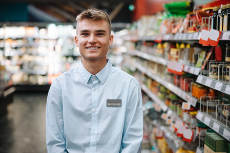 Student working in grocery store