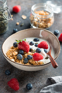 Healthy breakfast cereal with berries and yogurt