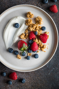 Healthy breakfast  cereal with berries and yogurt