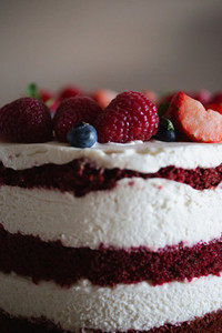 Bright and delicate sweet delicious cake with berries