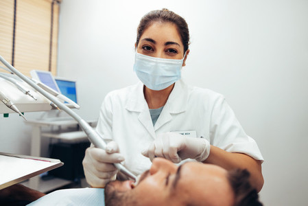 Doctor doing dental treatment
