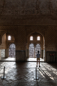 Girl enjoying the light of the Alhambra in Granada