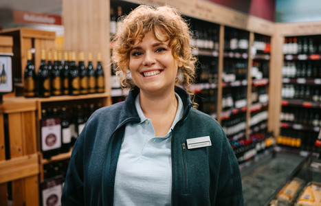 Friendly wine store worker