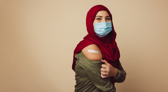 Muslim woman in hijab received a vaccine