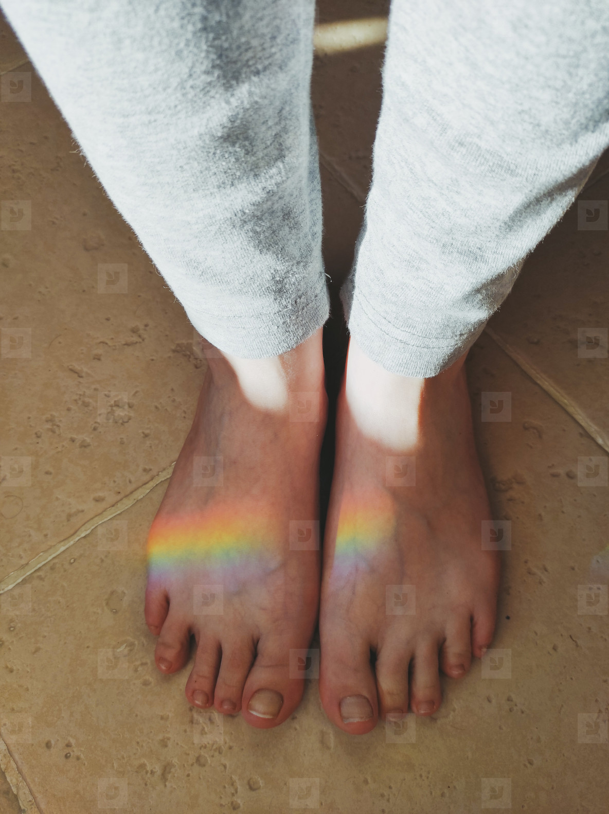 High angle view of a rainbow reflected over feet