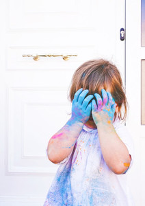 Little girl dirty of paint