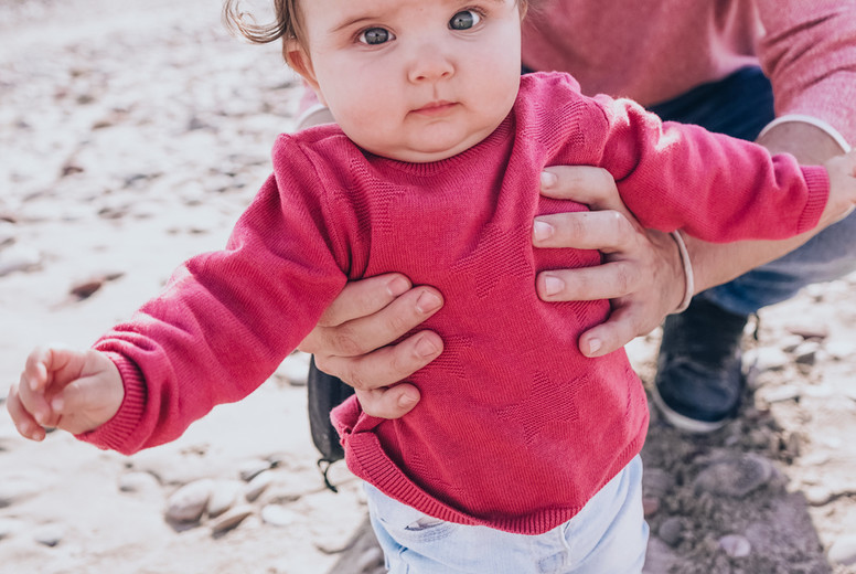 Young dad have a great day at the beach with his dauther