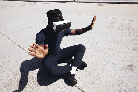 Young man wearing VR glasses