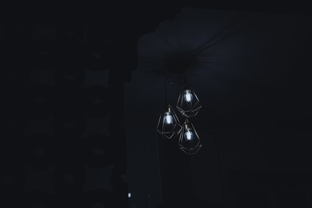 Low key image of a electric lamp during night