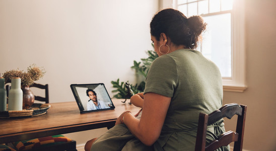Woman having telemedicine appointment with doctor