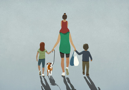Family with dog holding hands and walking with grocery bags